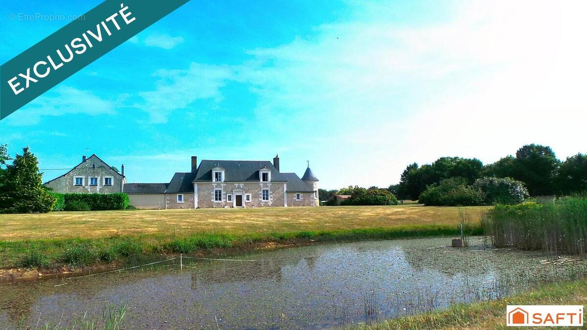 Photo 1 - Maison à NEUILLE-PONT-PIERRE