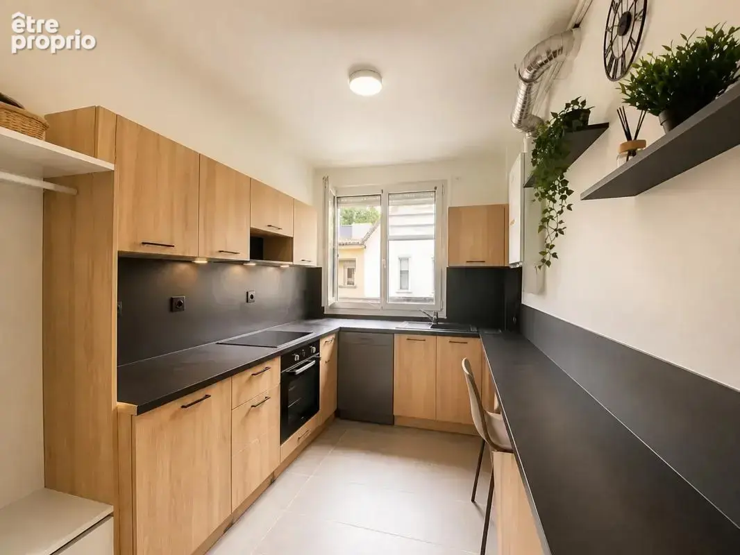 Appartement T4 de 83 m² à Noisy-le-Sec - photo 2