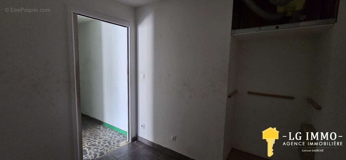 Appartement t3 + local commercial, centre bourg de mortagne - photo 19