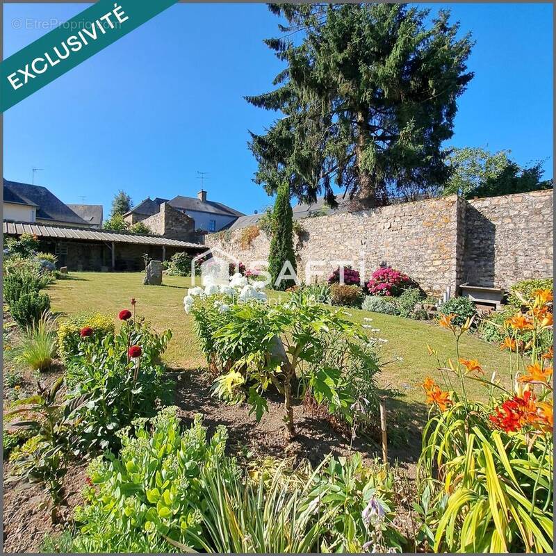 Photo 1 - Maison à JUVIGNE