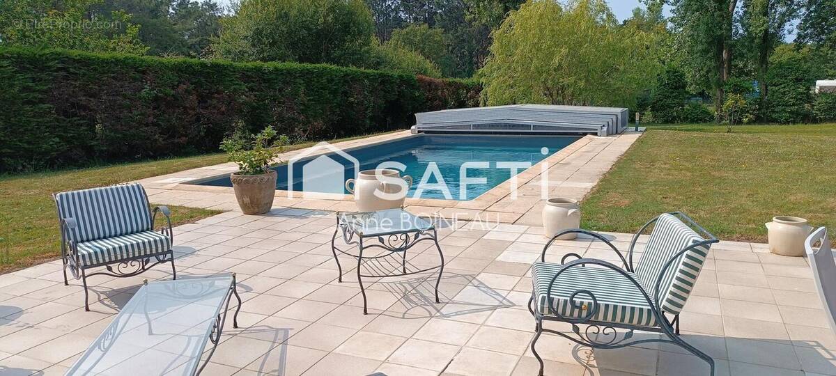 Photo 1 - Maison à LA TURBALLE