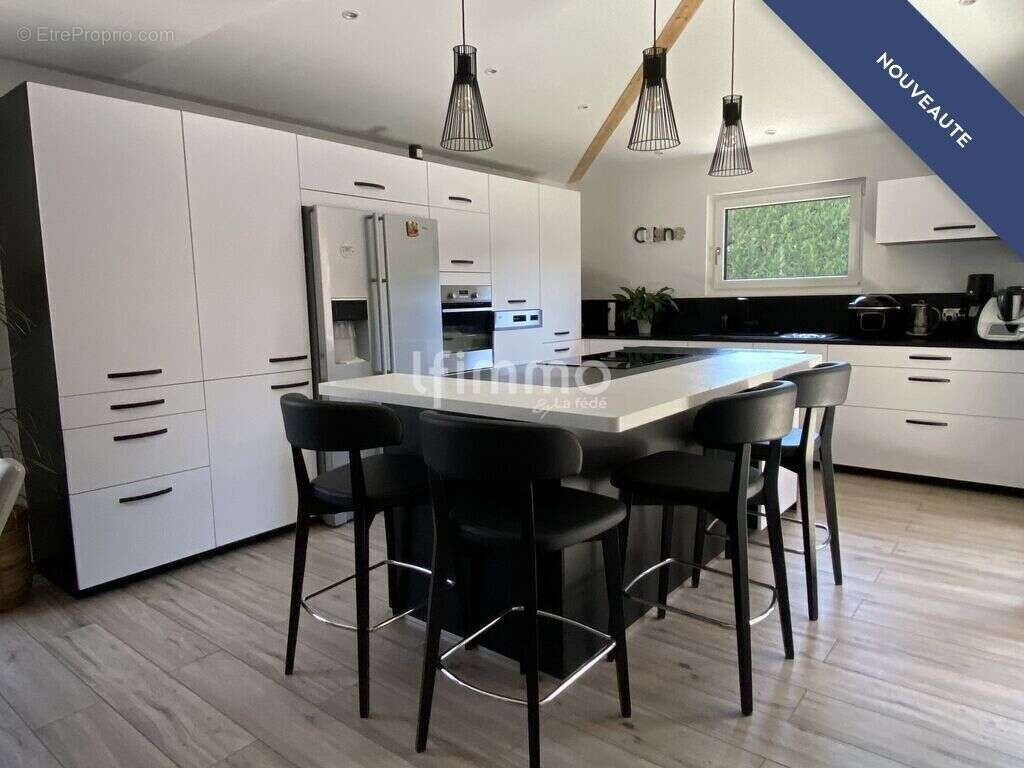 Maison 5 pièces de 116m² - photo 4