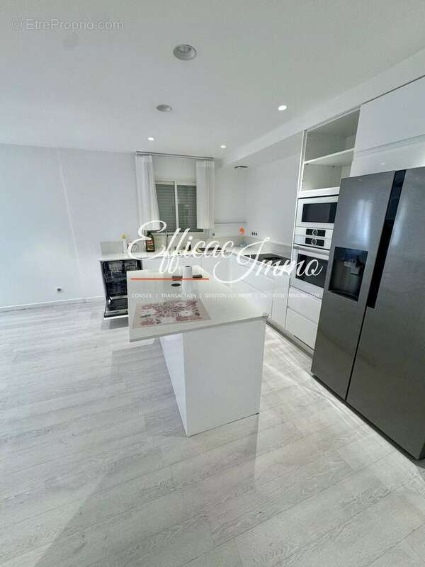 Bien à usage mixte de 154,51 m² avec garage, jardin et prestations haut de gamme - photo 3
