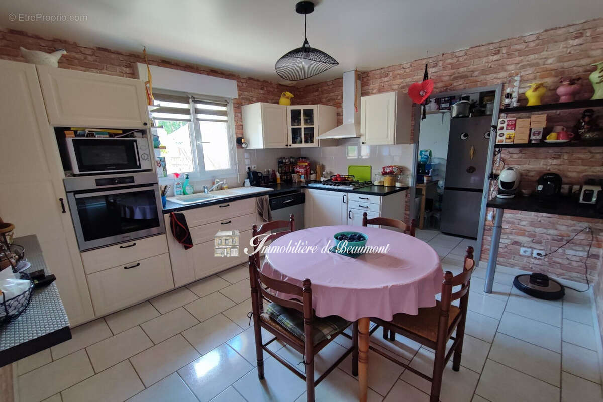 Maison 107 m² à Beaumont-Le-Roger  - photo 5