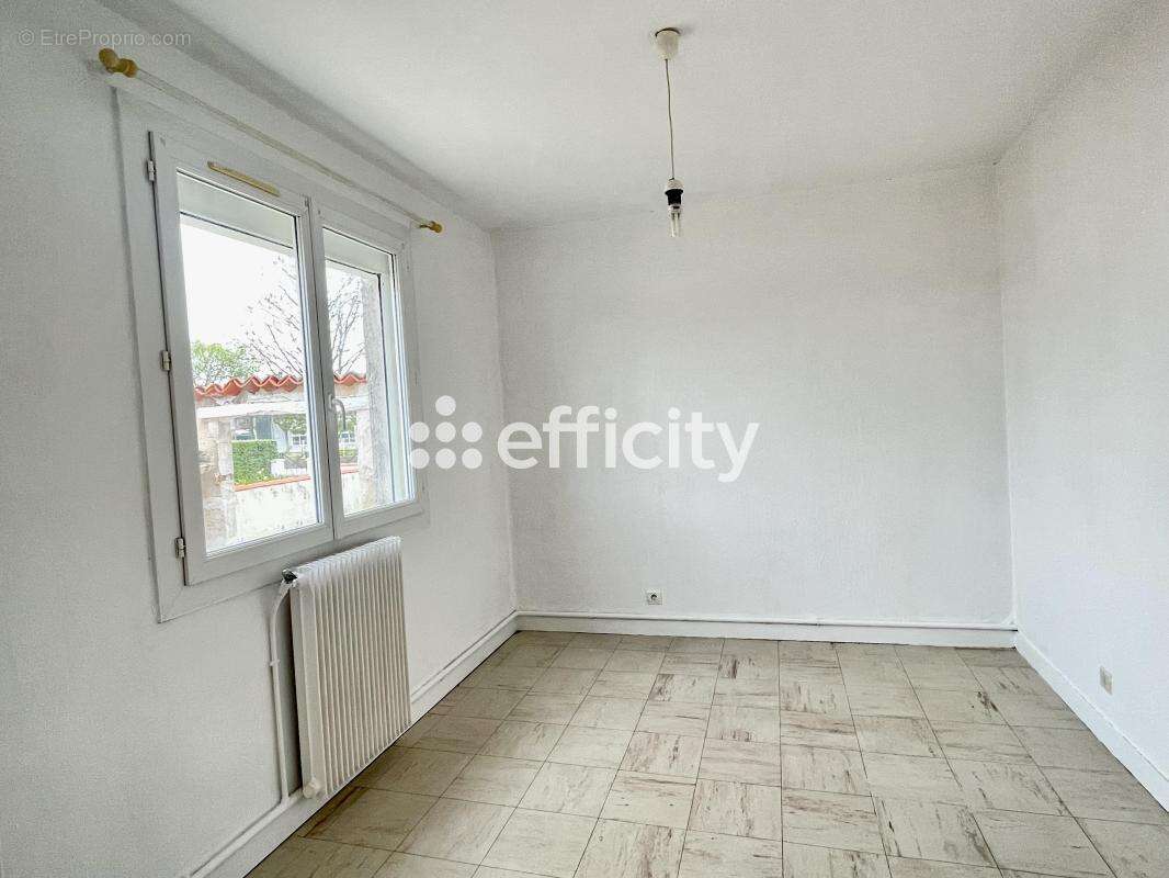 Maison 106 m² à Marennes  - photo 11