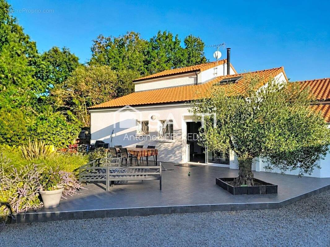 Photo 1 - Maison à BOUGUENAIS