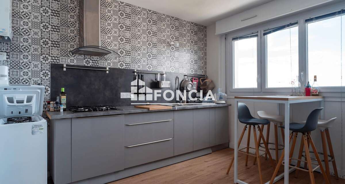 Appartement type 4 à proximité du centre-ville - photo 2