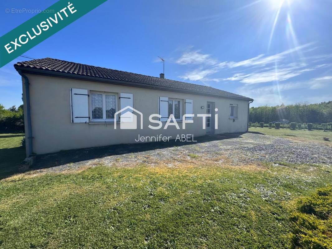 Photo 1 - Maison à LA CHAPELLE-SAINT-LAURENT