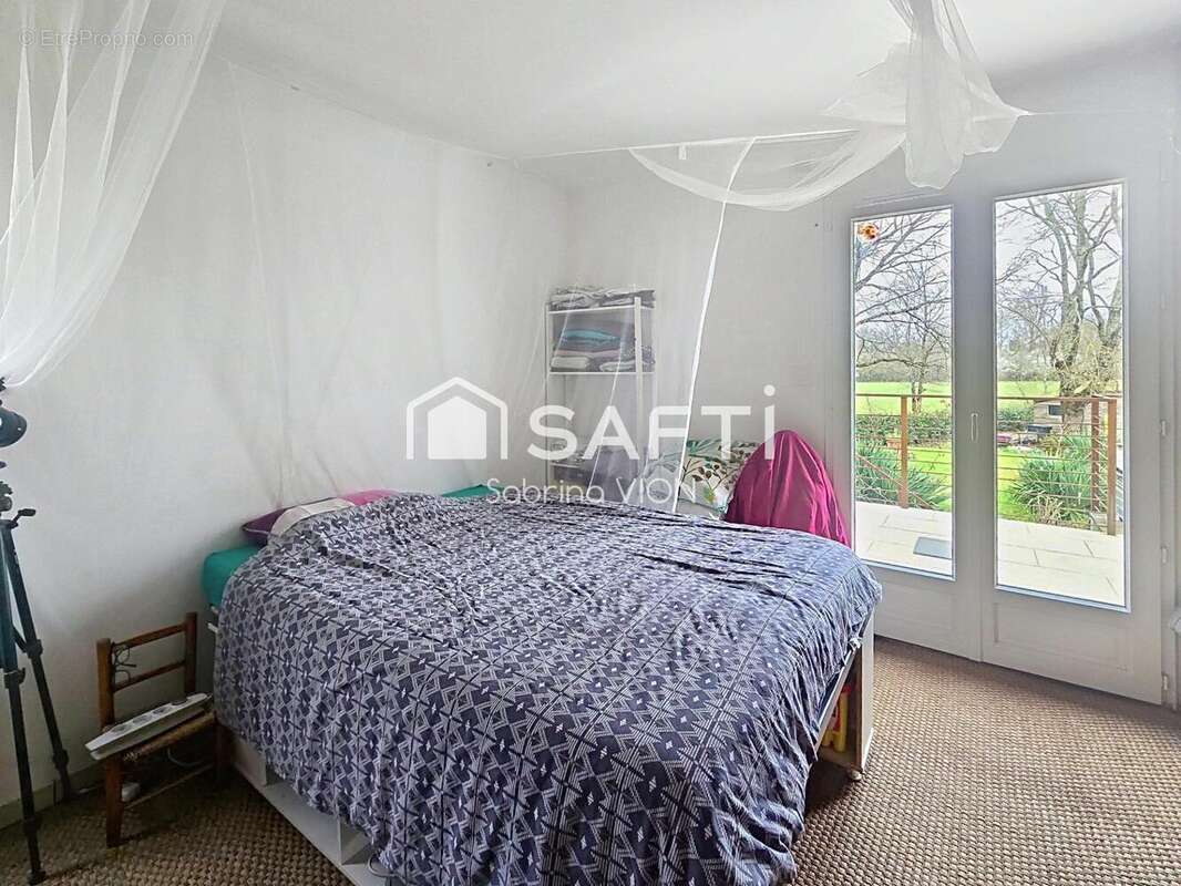 Photo 4 - Maison à SAINT-ETIENNE-DE-TULMONT