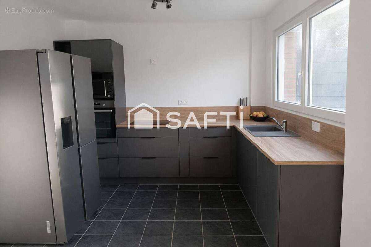 Photo 2 - Maison à FACHES-THUMESNIL