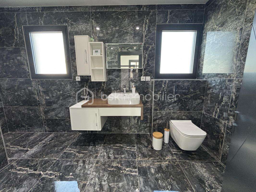 Maison de 227m² - photo 14