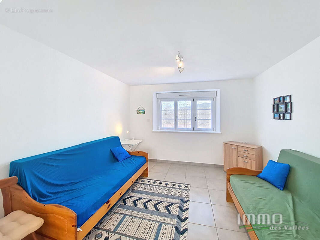 Appartement - rez-de-chaussée - photo 4