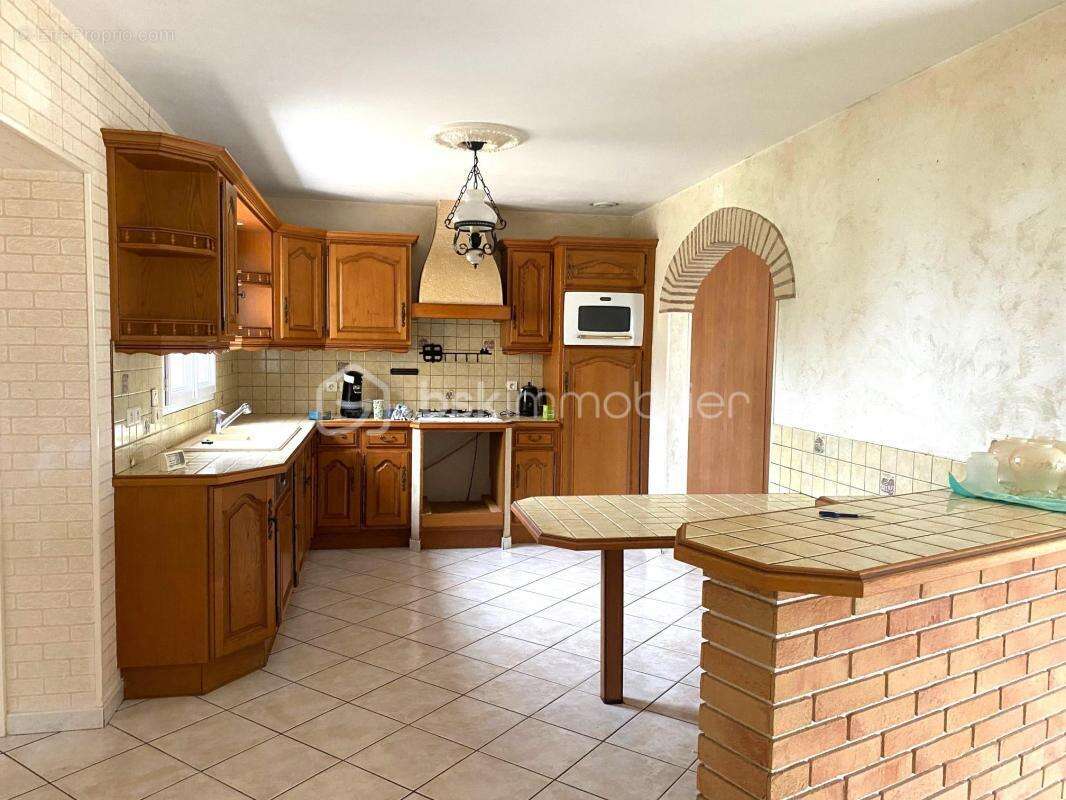 Villa de plein pied avec maison secondaire - photo 3