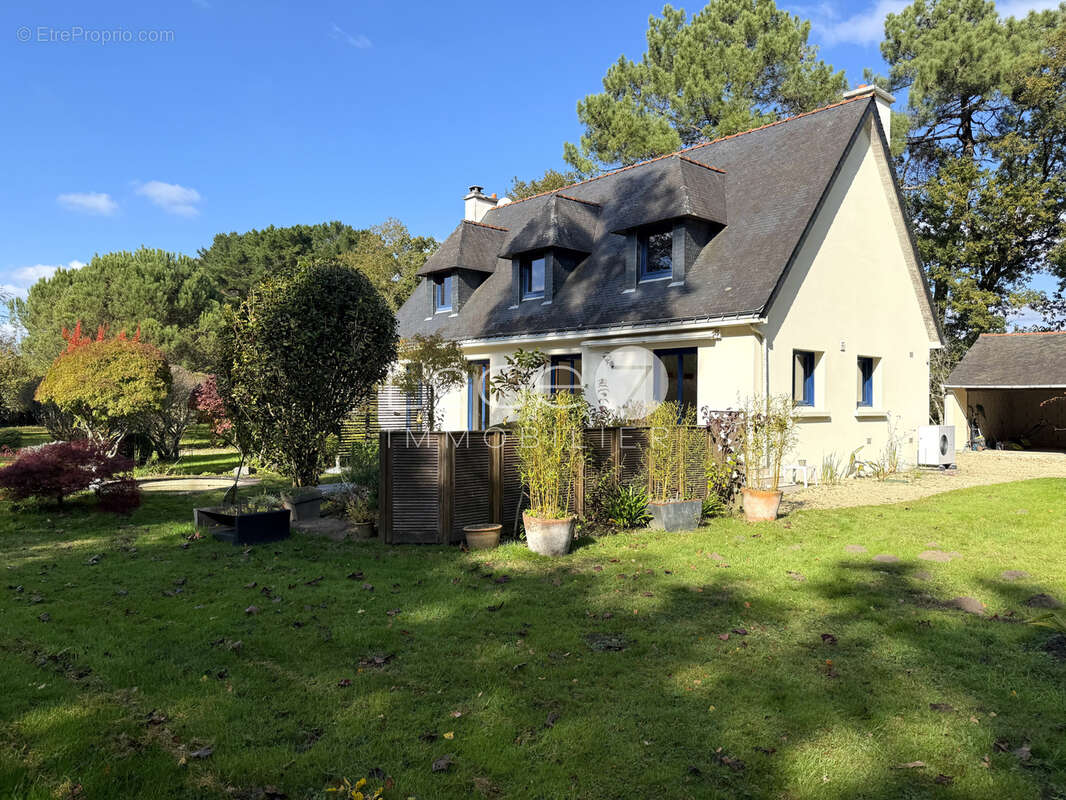 Maison avec vie de plain-pied sur un magnifique parc paysagé - photo 7