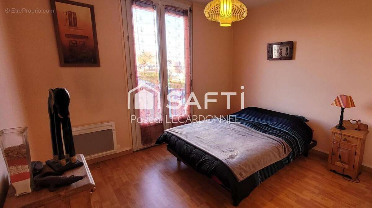 Photo 3 - Appartement à FLEURY-LES-AUBRAIS