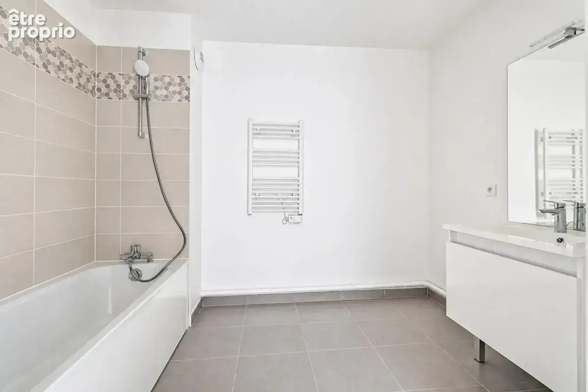 T3 73m² neuf – terrasse – double parking couvert - photo 6