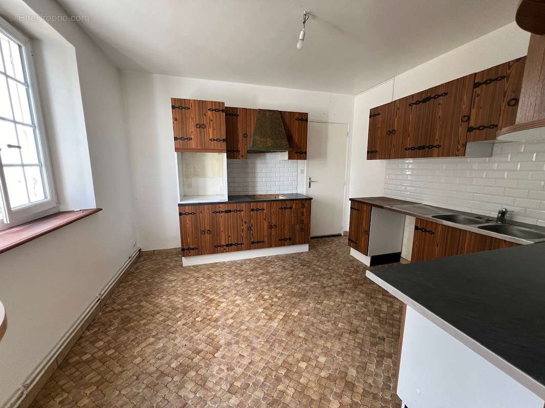 Maison 5 pièces en pierre et parpaing couverte en ardoise - photo 6