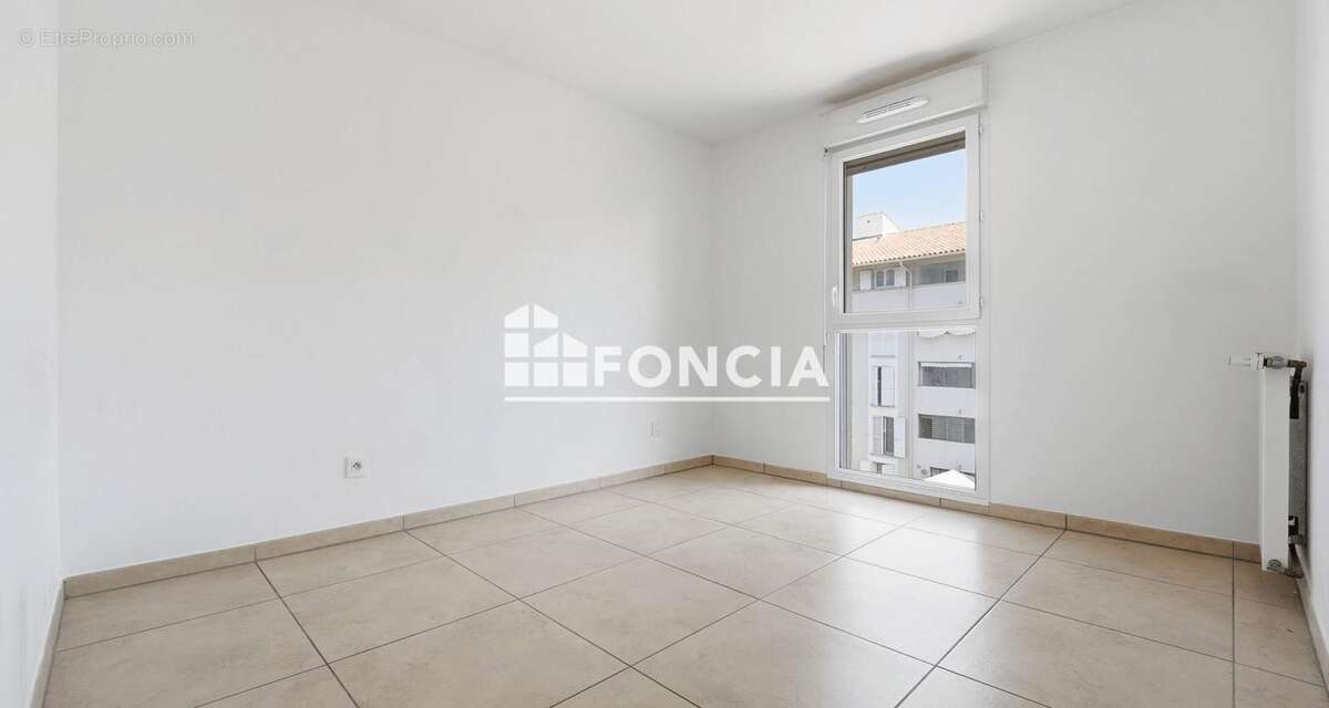 Appartement 2 pièces 39.35m2 - parking privatif - photo 6