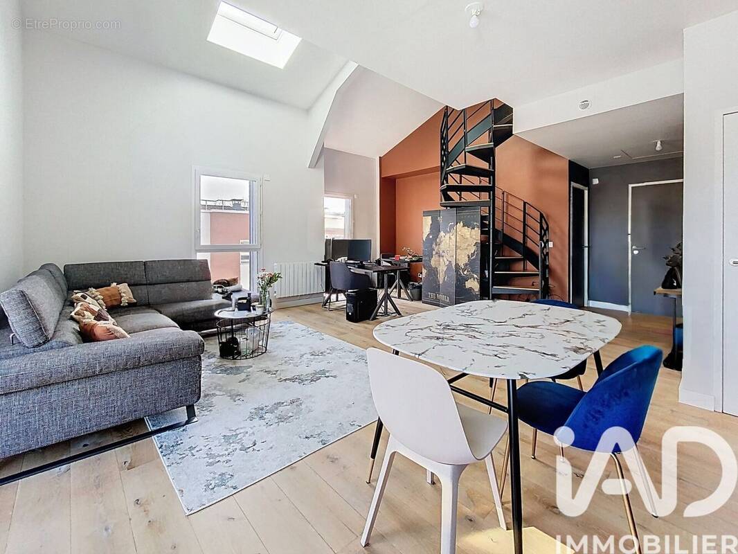 Photo 1 - Appartement à VOISINS-LE-BRETONNEUX