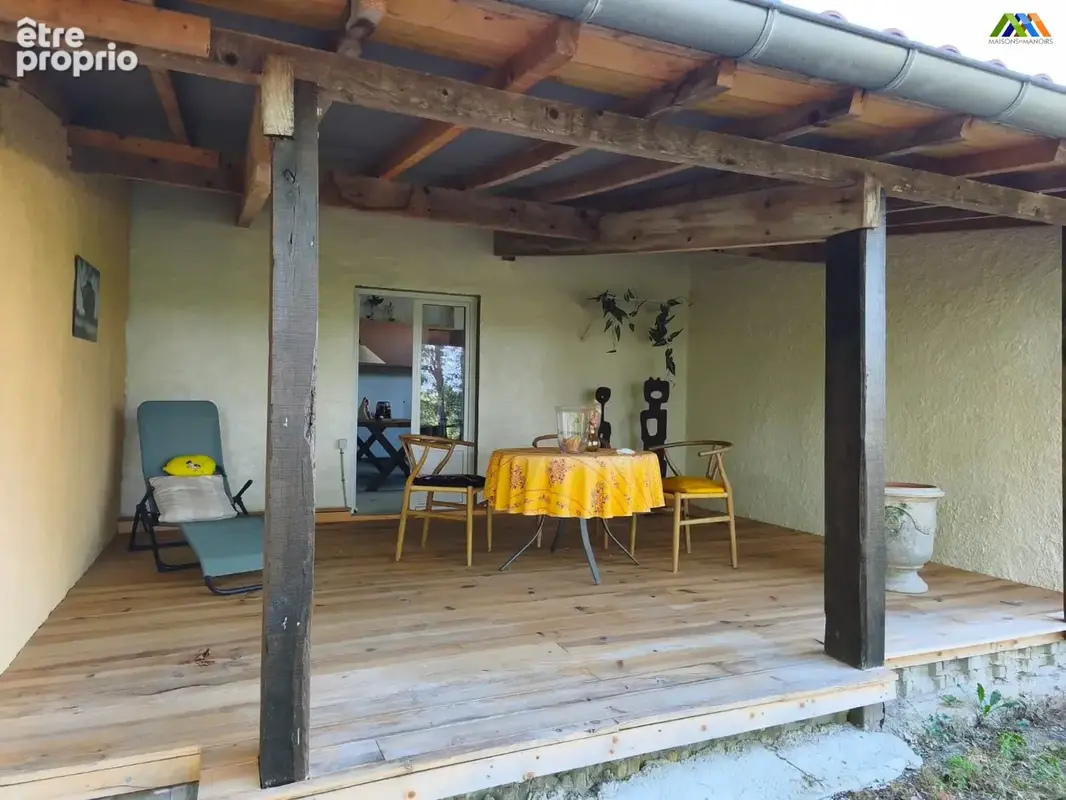 Covered terrace overlooking the peaceful garden and surrounding countryside