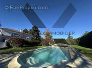 Maison à COMMELLE-VERNAY