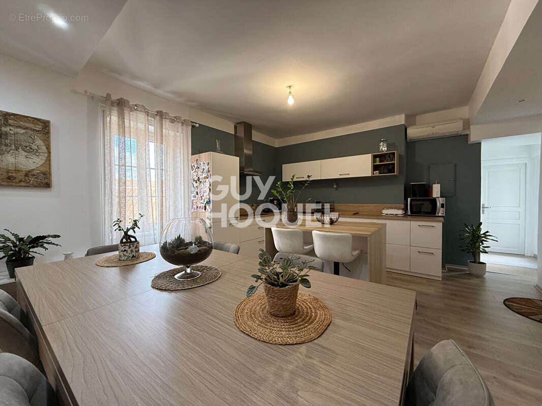 Appartement T2 Bis possibilité T3 au centre  d'Echalas de 73.27 m2 - photo 8