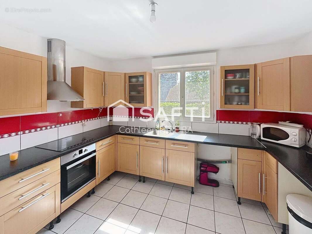 Photo 2 - Maison à SAINT-SULPICE