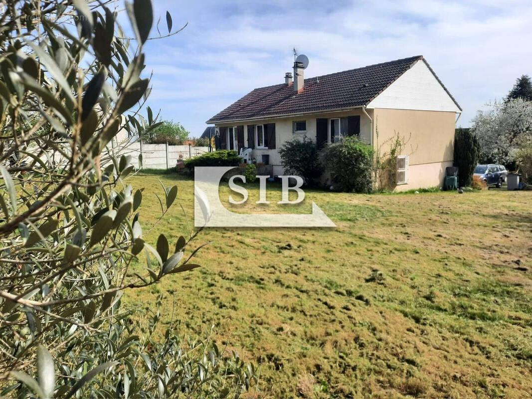 jardin façade arrière - Maison à MONTLHERY