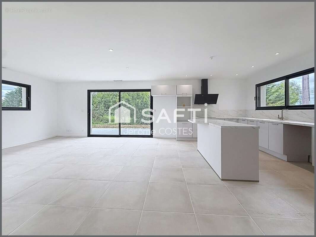 Photo 3 - Maison à MONTBETON