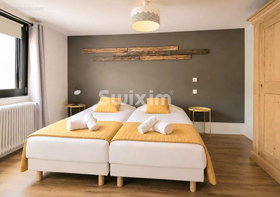Appartement 4 pièces, trois chambres, combles et stationnement couvert - photo 3