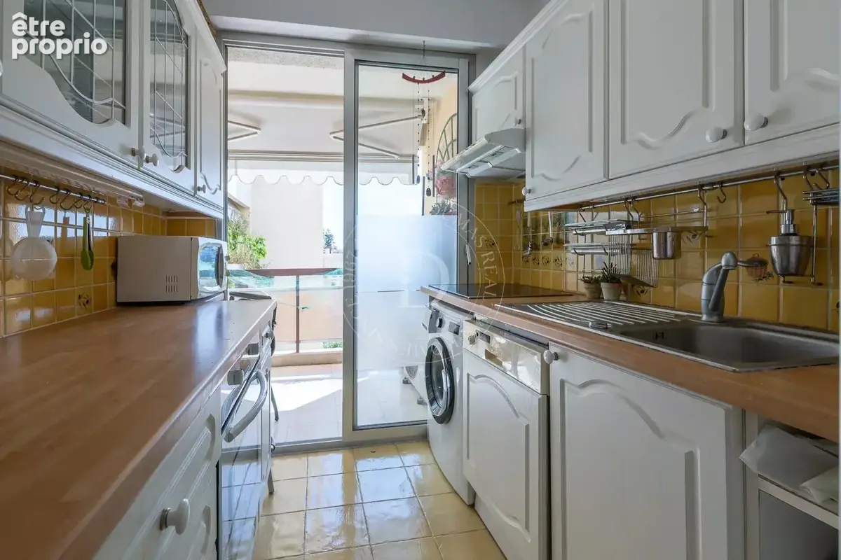 Trois pièces au calme avec piscine en plein centre-ville - photo 6
