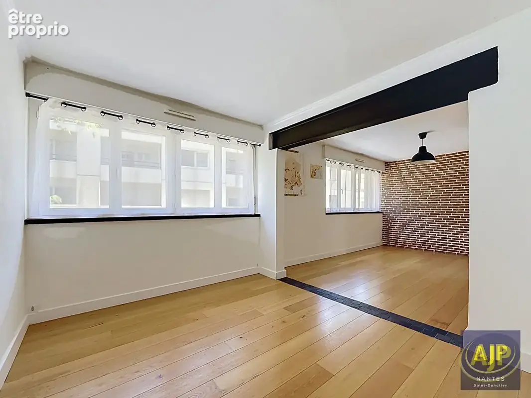 AJP IMMOBILIER NANTES - T3/T4 lumineux de 70 m² - Quartier Cité des Congrès / CHU - photo 4