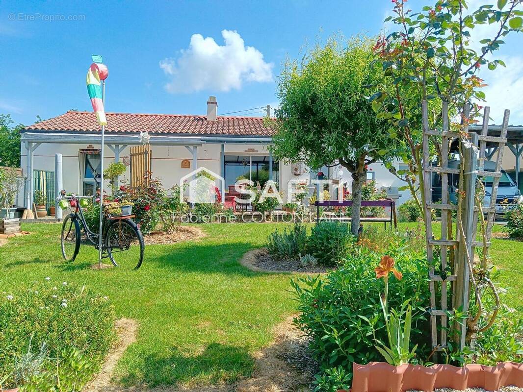 Photo 1 - Maison à LANDERONDE