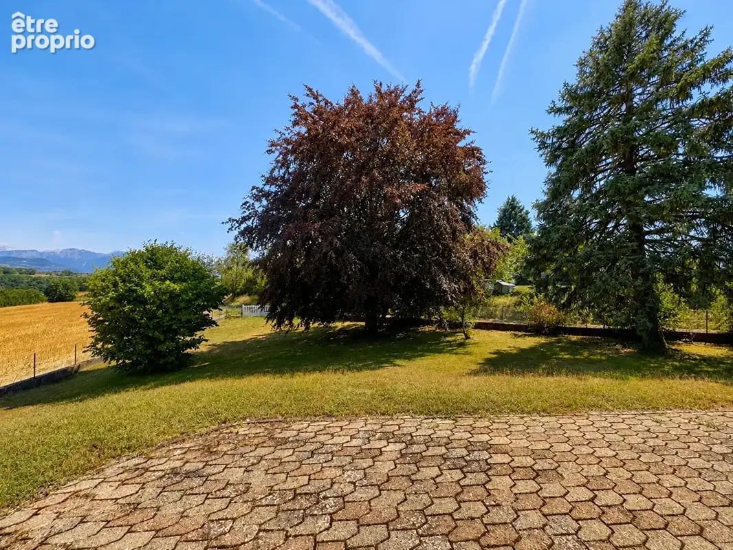 Maison individuelle à vendre 106 m², 3 chambres, sous-sol complet et terrain arboré de 2 000 m² - photo 6