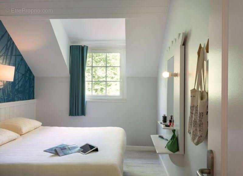 INVESTISSEMENT LOCATIF  CHAMOUILLE  Résidence de tourisme Center Parcs Le Lac d'Ailette - 6% de rentabilité - photo 5