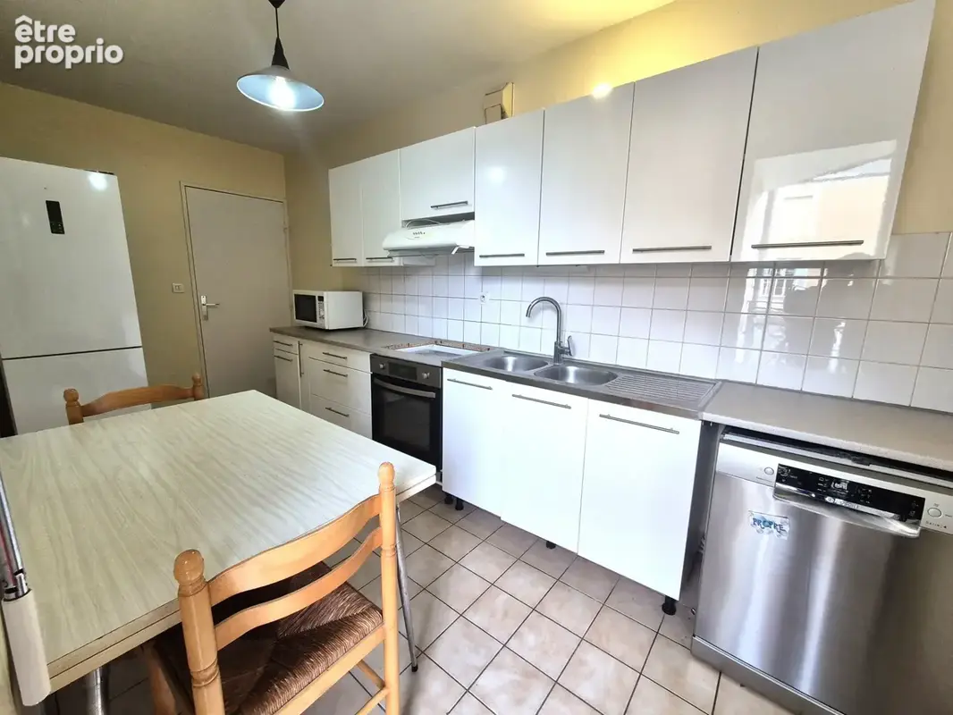 Appartement T3, cave et une place parking - photo 3