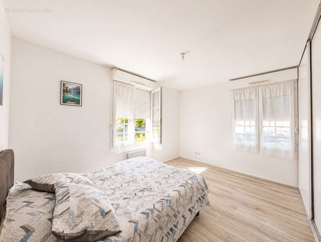 Maison 4 pièces de 100m2 avec 3 chambres et un jardin - photo 6