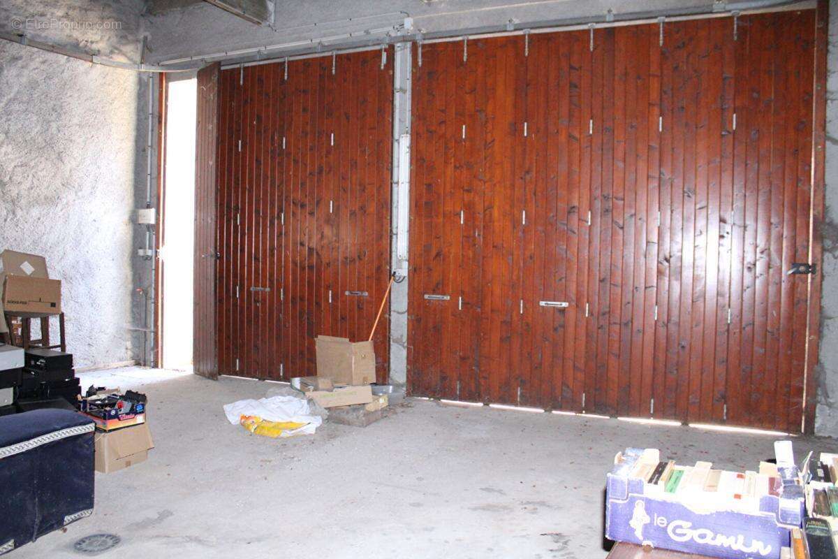 Maison avec local commercial et double garage de 66 m² - photo 11