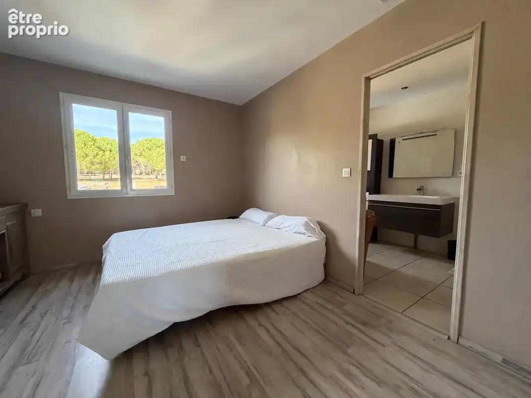 Villa de plain-pied avec piscine et grand terrain arboré à Villemoustaussou - photo 12