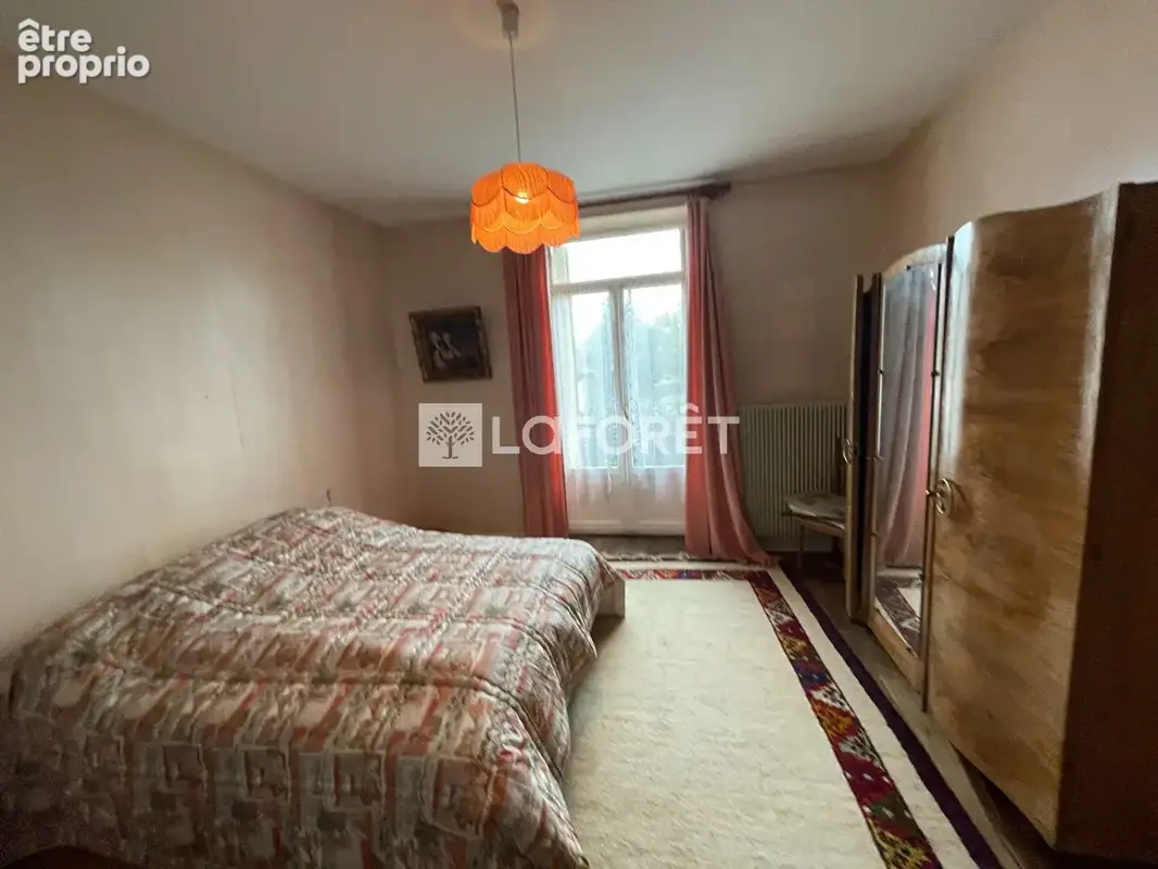 Lons-le-Saunier · Maison de caractère en pierre · 2 logements indépendants · Jardin 770 m² · Idéal investissement ou famille - photo 10