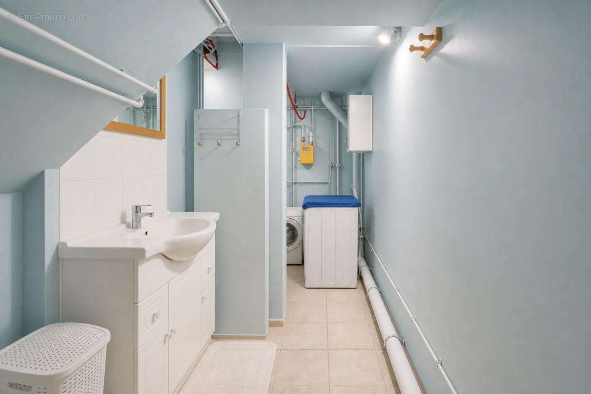 Maison de 5 pièces de 150 m² située à Sainte-Savine - photo 7