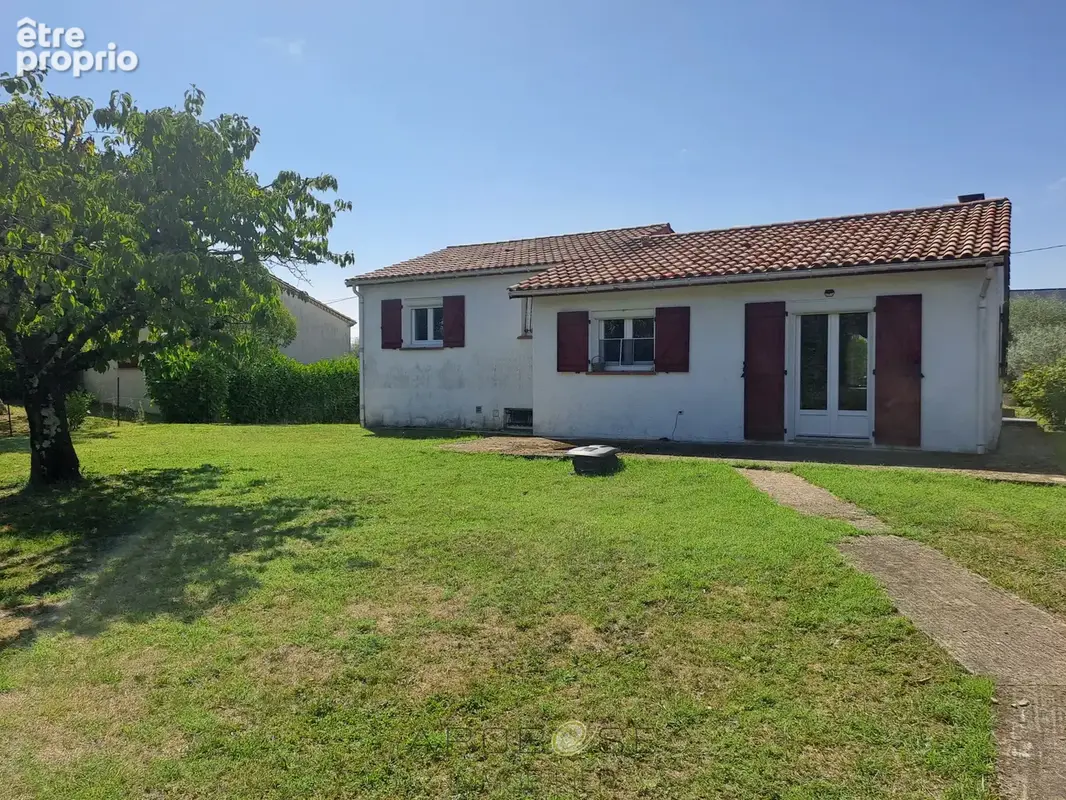 Maison de charme avec jardin, à pied des commerces, avec un  espace pro. - photo 24
