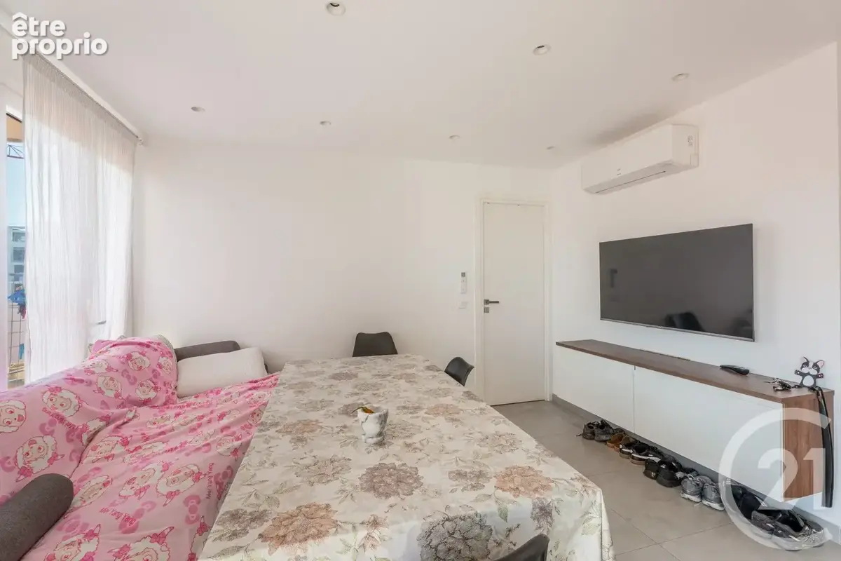 Appartement 5 pièces 80 m² à vendre à Nice (06200) - photo 4