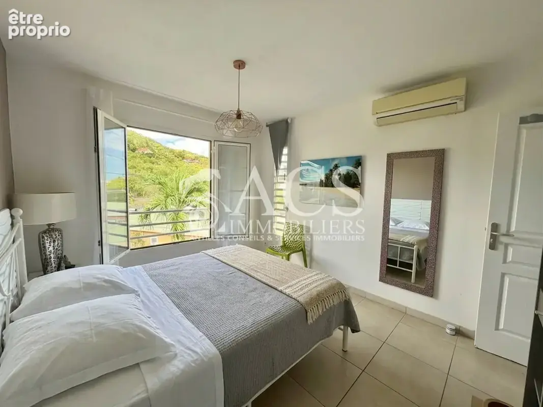 Superbe appartement T4 en dernier étage avec vue mer panoramique à l'Anse Mitan aux TROIS-ILETS - photo 7