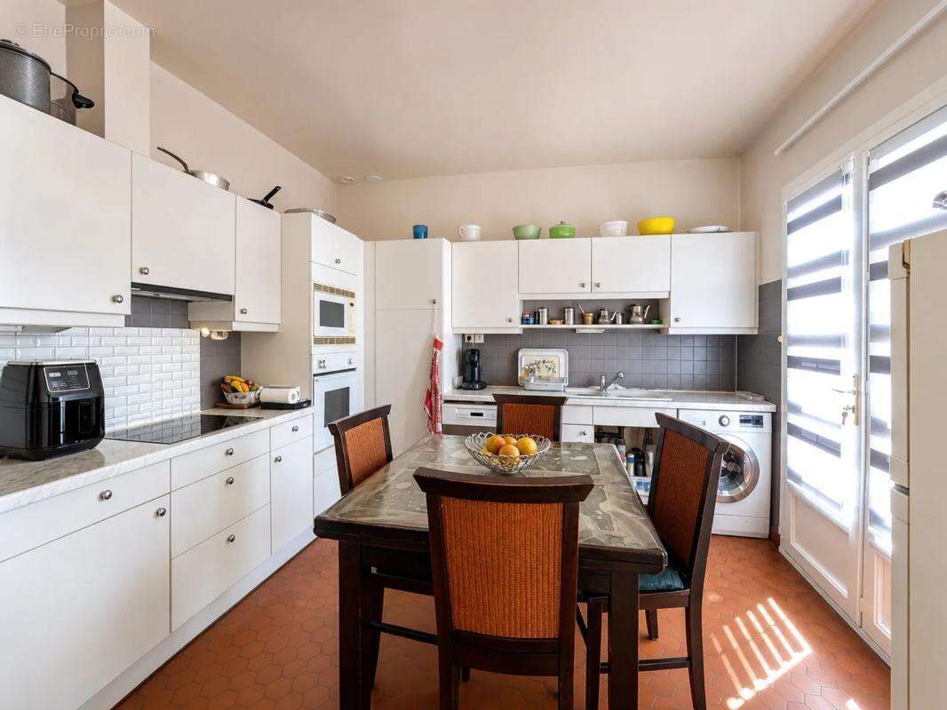 Maison familiale de 168m² avec jardin à Mézières-sur-Seine - photo 4
