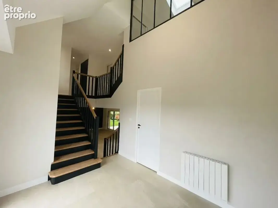 Maison familiale entièrement rénovée – 5 chambres – beaux volumes – sous-sol total - photo 6