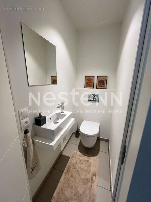 Appartement 3 pièces de 74 m2 situé en bordure de mer au centre du village, à l'entrée du port. - photo 14