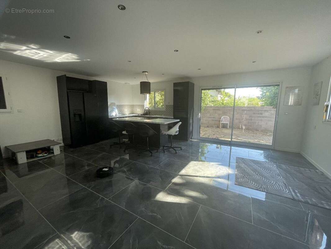 Maison 115 m² à Villeneuve-Tolosane  - photo 3