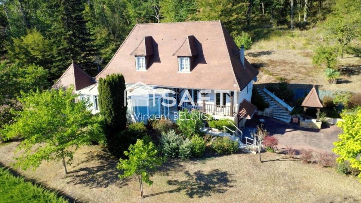 Photo 1 - Maison à TERRASSON-LAVILLEDIEU