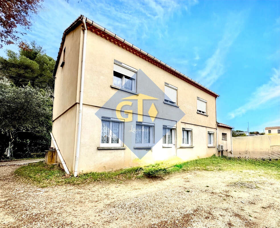 Maison à LAUDUN-L&#039;ARDOISE